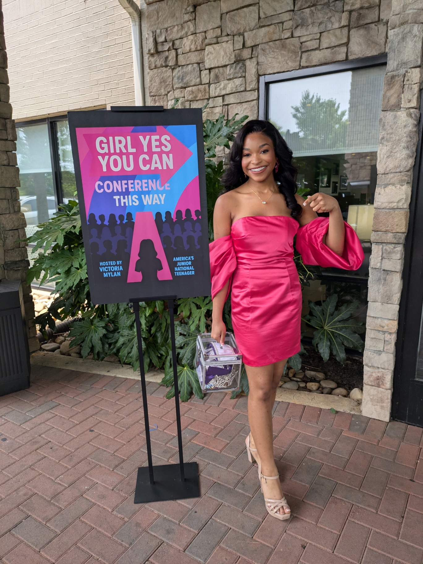 Victoria Mylan at the Girl Yes You Can Conference 2025 welcome sign