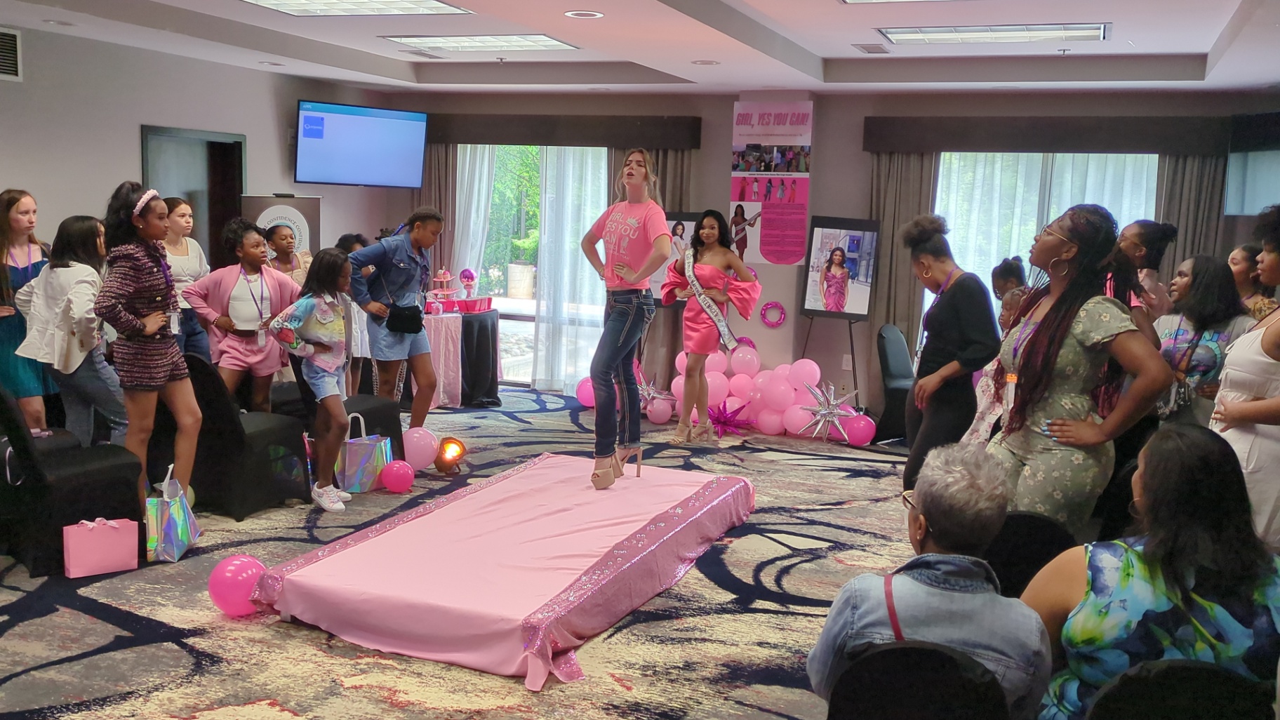 Girls walking the runway at the Girl Yes You Can Conference 2025